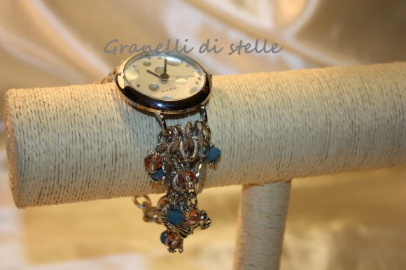 Orologio Bracciale artigianale. GRANELLI DI STELLE. CREAZIONI VENDITA NEGOZIO, BIJOUX ARTIGIANALI: ANELLI, BRACCIALI, COLLANE, ORECCHINI, CIONDOLI, SEGNALIBRI, ACCESSORI CERIMONIA, PARURE